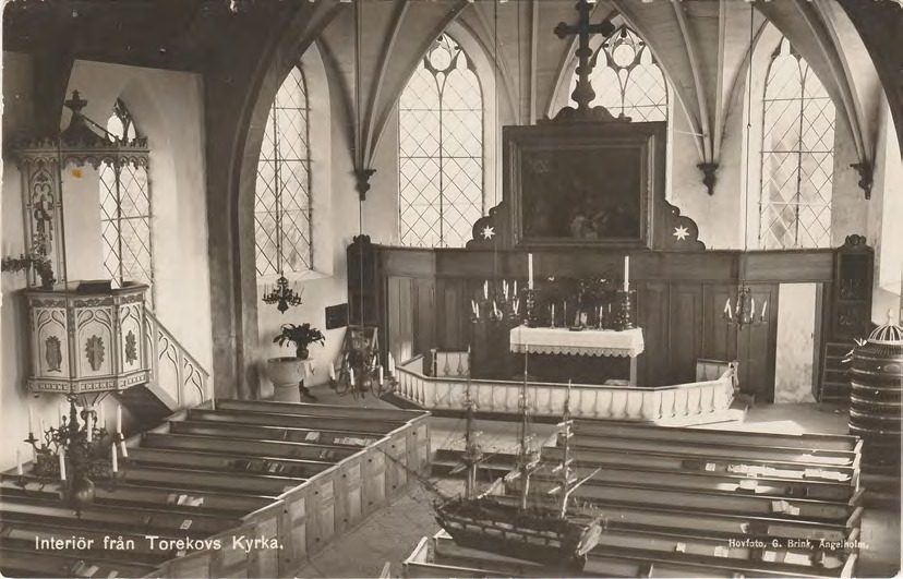 Framsida av Interiör från Torekovs Kyrka.